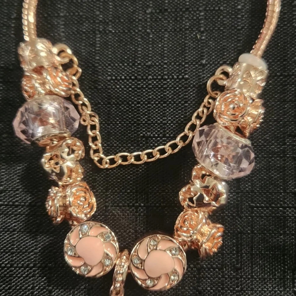 Elegant Rose Gold Bracelet with Pink Accents. ITEM No. 19-145